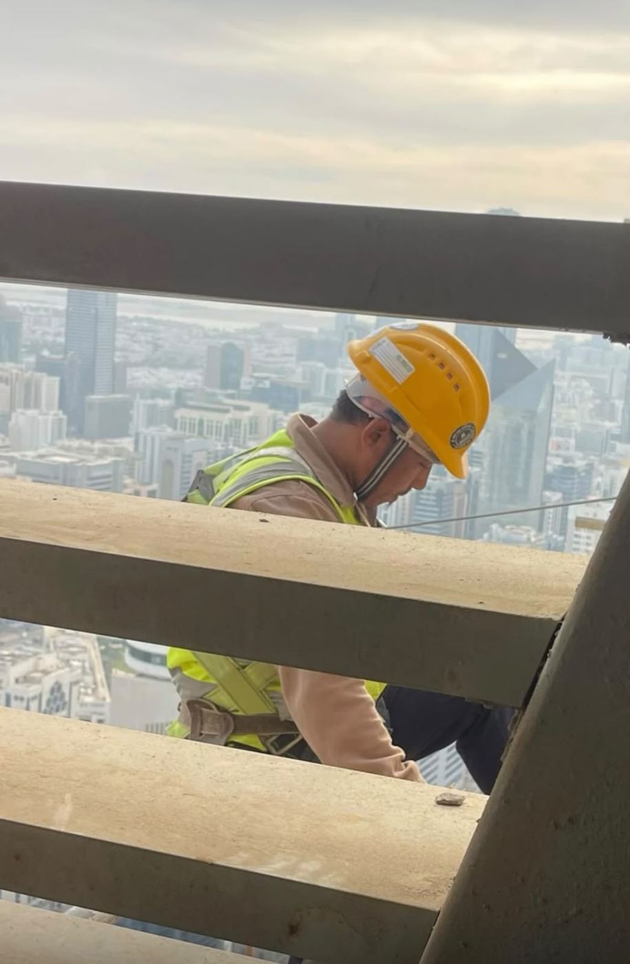 Worker above skyline